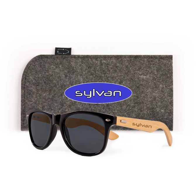 A pair of black sunglasses with wooden arms, accompanied by a grey case featuring a logo.