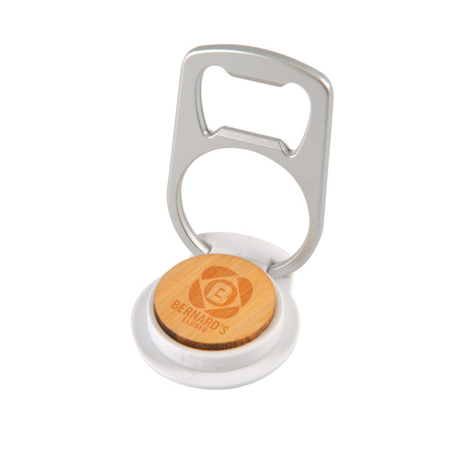 A drink bottle opener in silver with a wooden base and a white circular holder. Features a logo on the wooden part.