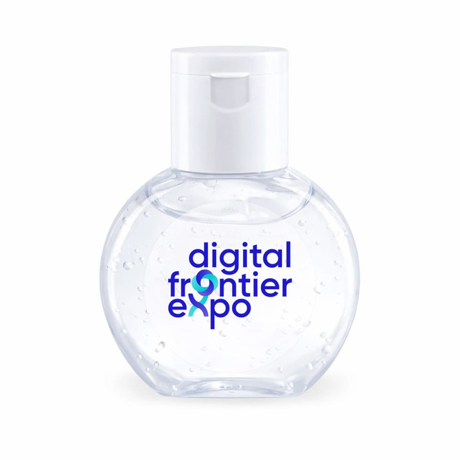 A clear hand sanitiser bottle with a circular shape and a flip-top lid, featuring a logo on the front.