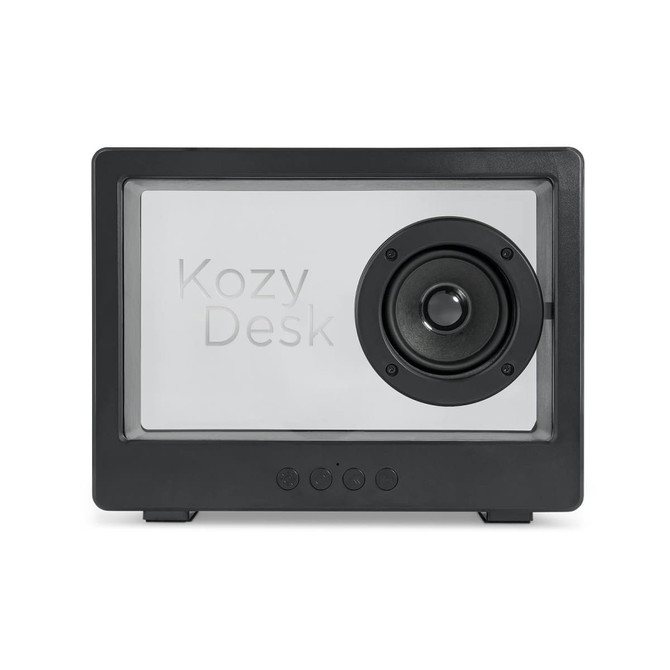 A black speaker with a prominent circular speaker and a transparent front, featuring branding and control buttons at the bottom.