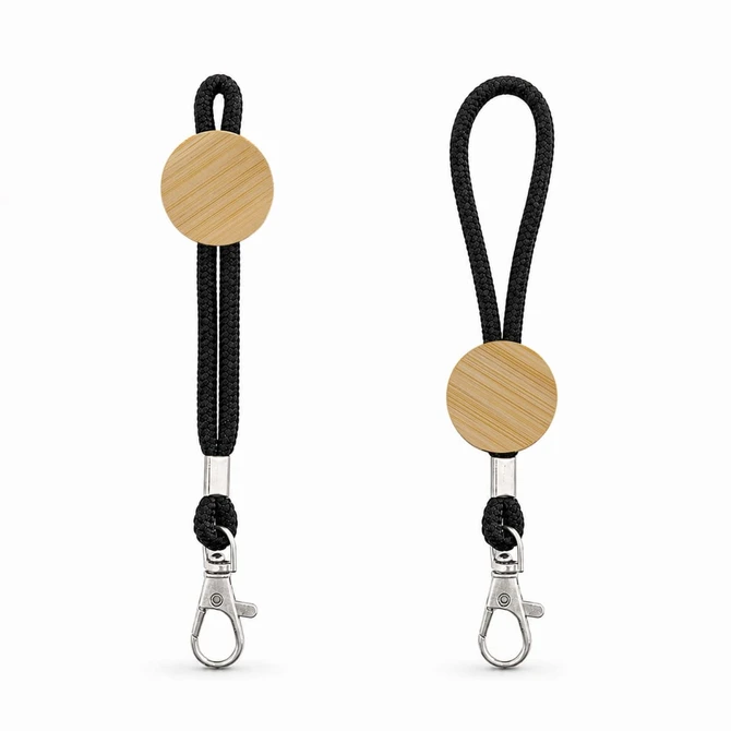 A keytag with a round wooden accent and a black rope strap, featuring a metal clasp for attachment.