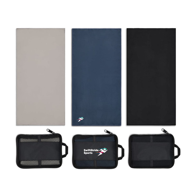 A set of three sports towels in grey, blue, and black, displayed with a mesh storage pouch featuring a logo.