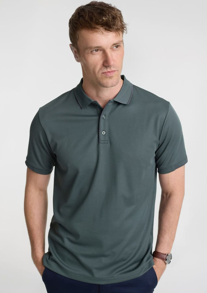 A men's short sleeve polo in a deep green colour, featuring a classic collar and a logo on the chest.