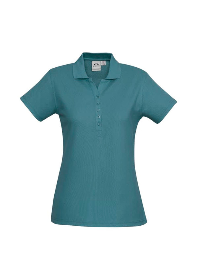 A teal polo shirt for ladies with a collar and button placket, featuring a logo on the label.