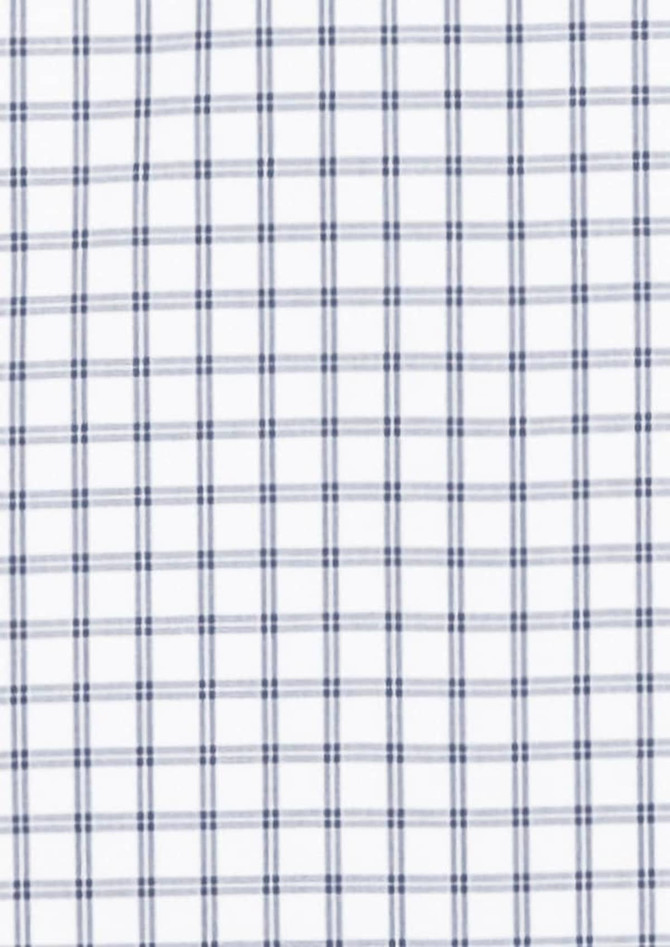 A white long sleeve shirt featuring a navy blue checked pattern, with a logo on the label.
