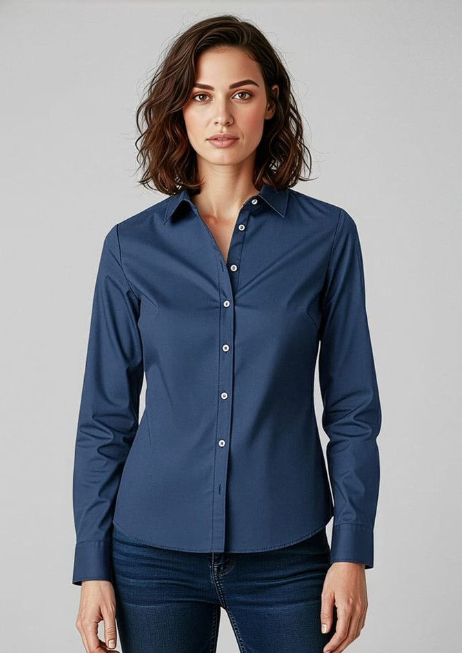 A navy long sleeve button-up shirt featuring a collared neckline and a fitted design. It has a logo on the chest.