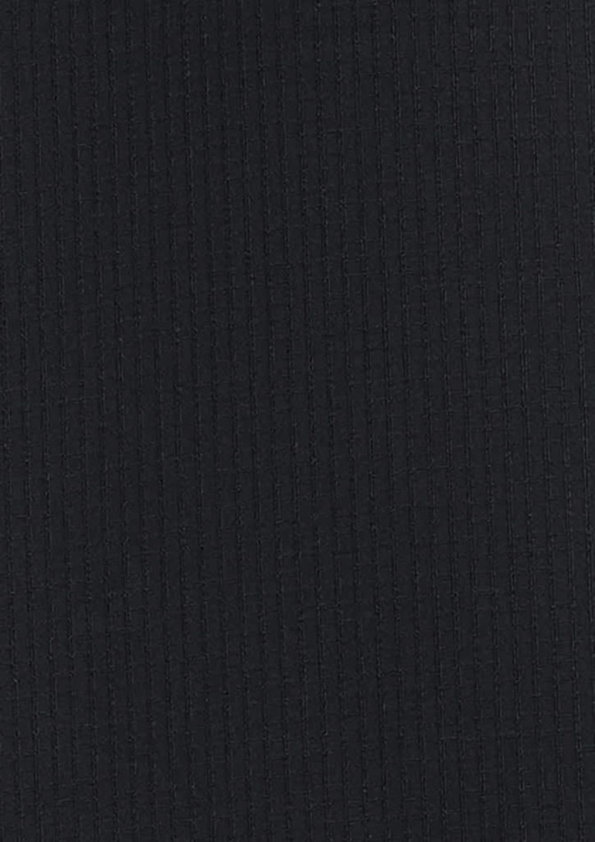 A long sleeve shirt in a solid black fabric with a ribbed texture. Features a logo on the chest area.