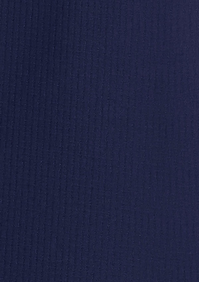 A navy blue long sleeve button-up shirt with ribbed texture and a logo.