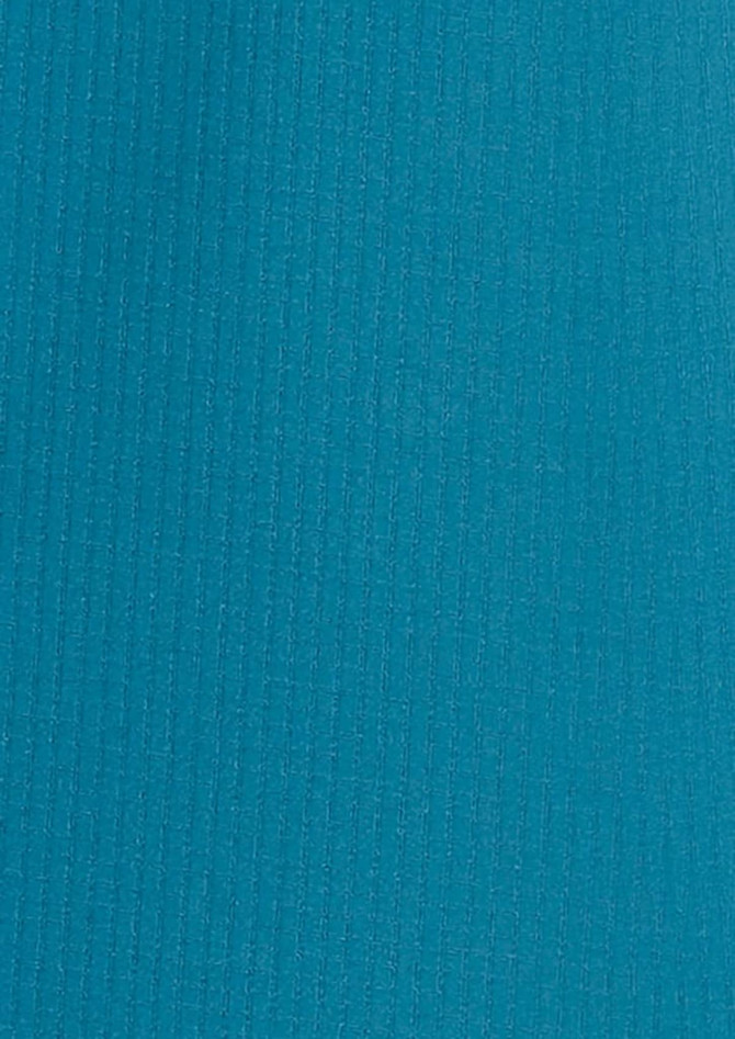 A long sleeve women's outdoor shirt in a vibrant teal colour, featuring a textured fabric and a logo.