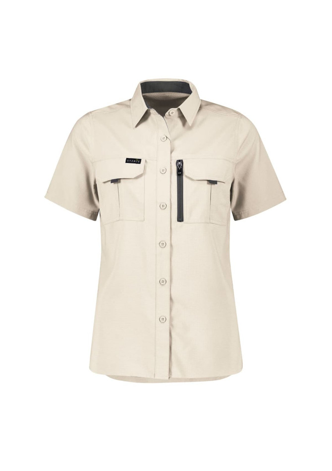 A short sleeve women's outdoor shirt in light beige, featuring two front pockets and a zip pocket, with a logo.