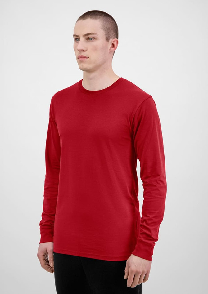 A red long sleeve tee displayed on a model, featuring a simple design and a logo.