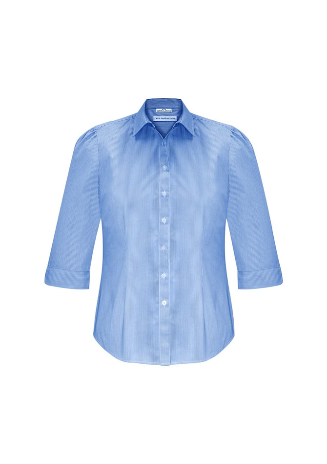 A women's button-up shirt in light blue with 3/4 sleeves and a fitted design, featuring a logo on the label.