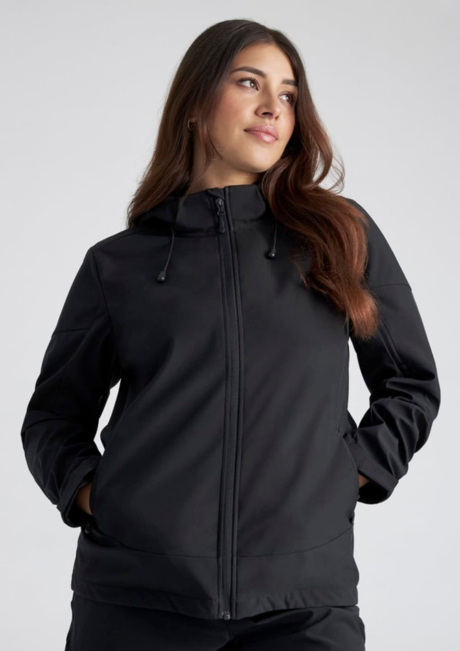 A black women's jacket with a hood, featuring a front zip and pockets, has a logo on it.