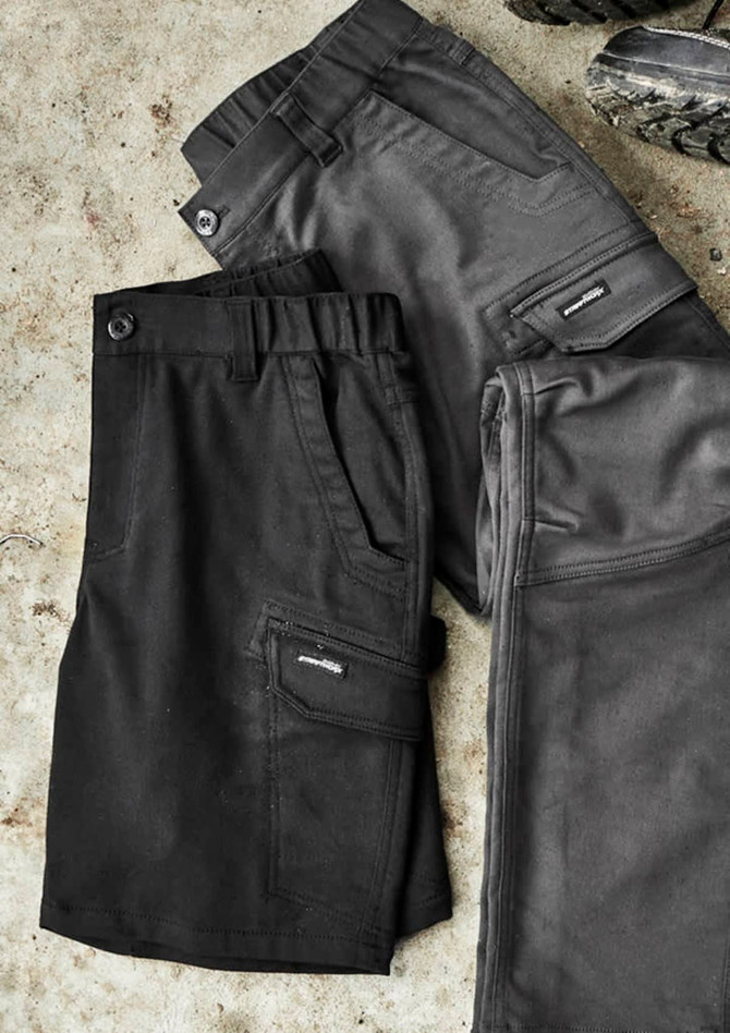 A pair of men's work shorts in black and grey, featuring pockets and a logo. The fabric has a sturdy texture.