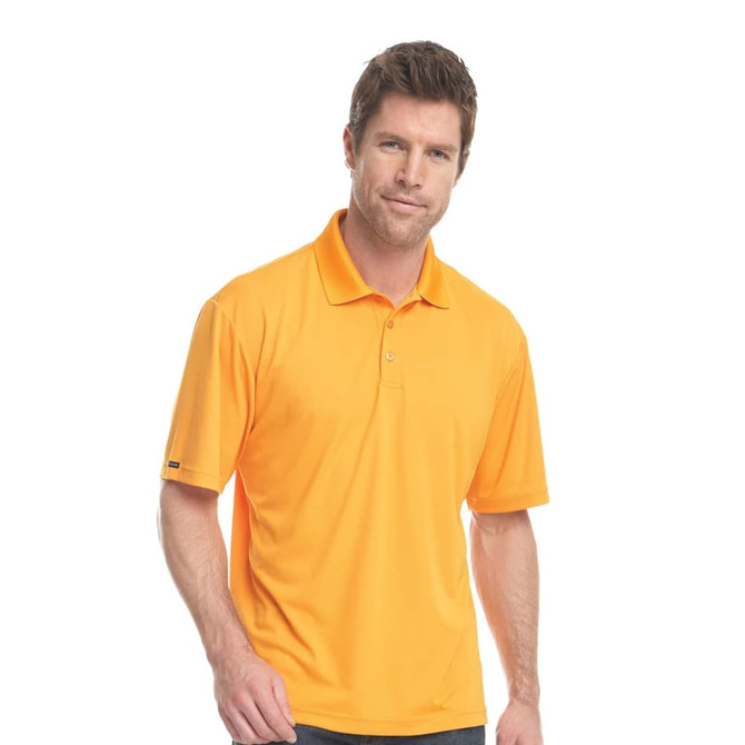 A man wearing a bright yellow short sleeve polo shirt with a logo on the sleeve.