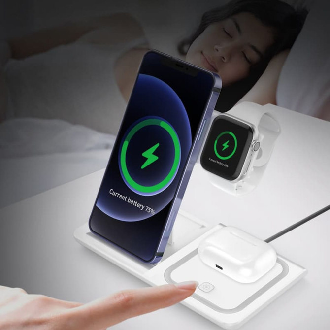 A white 15W 3-in-1 fast wireless charger with a phone, smartwatch, and earbuds, featuring a logo.