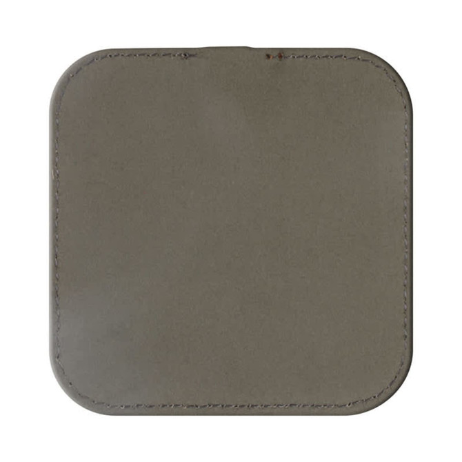 A square grey wireless charger with rounded edges and visible stitching, featuring a logo on its surface.
