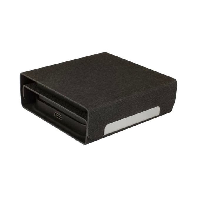 A black wireless charger with a textured finish and a sleek design, featuring a charging port and branding.
