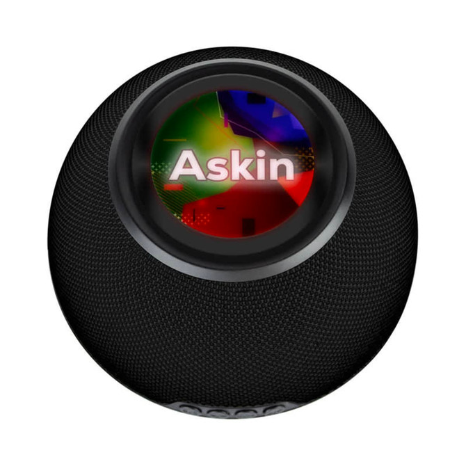 A black wireless charging speaker featuring a round design and a central logo.