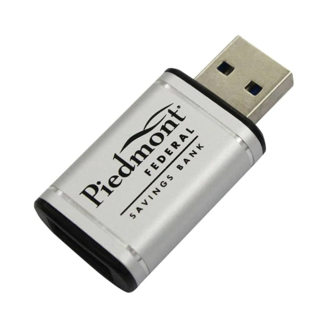 A silver USB data blocker with a metal body and a USB connector, featuring a logo.