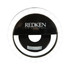 A round, black LED selfie light with outer white lights and a central circular opening. It features a logo.