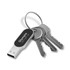 A silver LED flash drive attached to a keyring alongside three metallic keys, featuring a black and silver design.