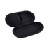 A black zippered case with a mesh pocket inside, featuring a durable exterior and a soft interior.