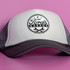A cap featuring a white front with a grey mesh back and a logo.