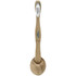 A bamboo toothbrush with a natural wooden handle and white bristles, placed in a circular holder.
