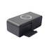 A black wireless charging speaker with a sleek design and a wireless charging pad on top.