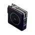 A black portable power bank with a circular design, USB ports, and a battery level indicator. It has a logo design.