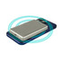 A silver 15W MagSafe wireless power bank placed on a blue smartphone, with a glowing ring indicating wireless charging.