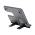 A grey wireless charger stand with three positions and a tapered design, featuring a logo on the back.