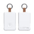 A white power bank with a keyring loop and a brown leather strap, featuring a built-in charger and indicator lights.