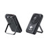 A black wireless power bank with a stand, featuring multiple ports and a charging pad.