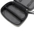 A grey toiletry bag with a zippered closure, featuring an interior pocket divider and a lined black interior.
