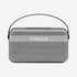 A rectangular grey wireless speaker with a black handle and a mesh front, featuring a logo on the front.