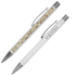 Two metal ballpoint pens in white and patterned design, featuring silver accents and clips. Each pen has a logo.