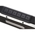 A waterproof outdoor Bluetooth speaker in black with control buttons on top, featuring a textured surface and a logo.