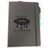 A black notebook with an elastic band closure and a logo featuring dripping lips, accented with colour tabs.