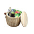 A wicker cooler basket in natural tones, containing drinks, snacks, and a wooden lid. It features a logo.