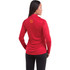 A woman wearing a red long-sleeve half zip jacket, featuring a logo on the back.