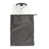 A grey toiletry bag containing a neatly folded white shirt. The bag features a drawstring closure and a logo.