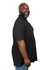 A black men's polo shirt displayed on a model in profile, featuring a subtle logo on the chest.