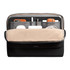 A black laptop caddy with a beige interior, featuring multiple compartments for devices and accessories.