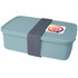 A lunch box in a muted blue colour, featuring a grey strap and a small logo on the lid.