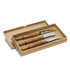 A set of three cheese knives with wooden handles and stainless steel blades in a cardboard box.