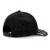 A black cap with a patterned peak, featuring a snapback closure and a logo on the back.
