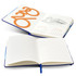 A full colour notebook with a blue cover featuring illustrated pages and a calendar layout. It has a logo on the cover.