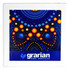 A square ceramic coaster featuring a vibrant blue design with orange and yellow dots, alongside branding.
